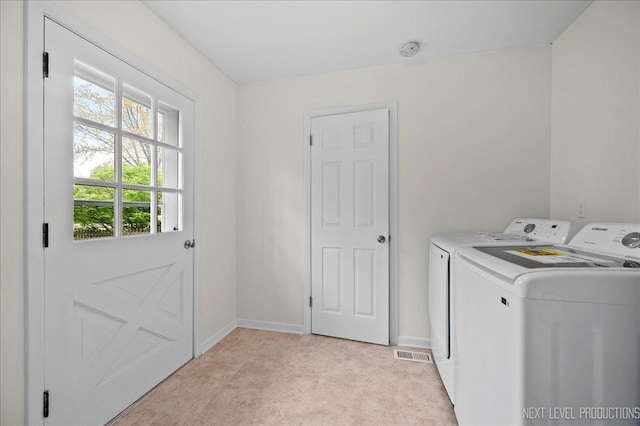16 Circle Dr E, Montgomery, IL 60538 - washroom with washing machine and clothes dryer, light carpet, and baseboards