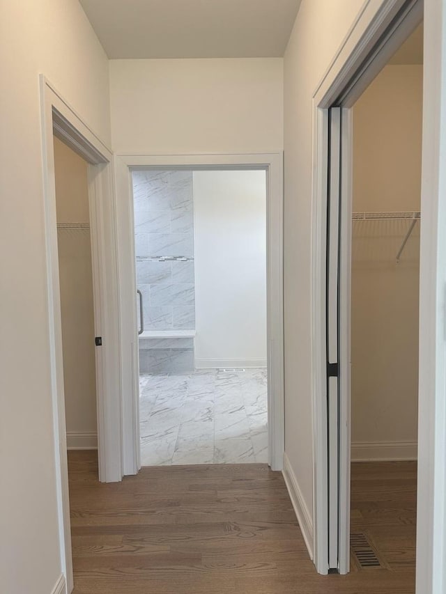 9014 Gloucester Rd, Woodridge, IL 60517 - hall featuring wood finished floors and baseboards