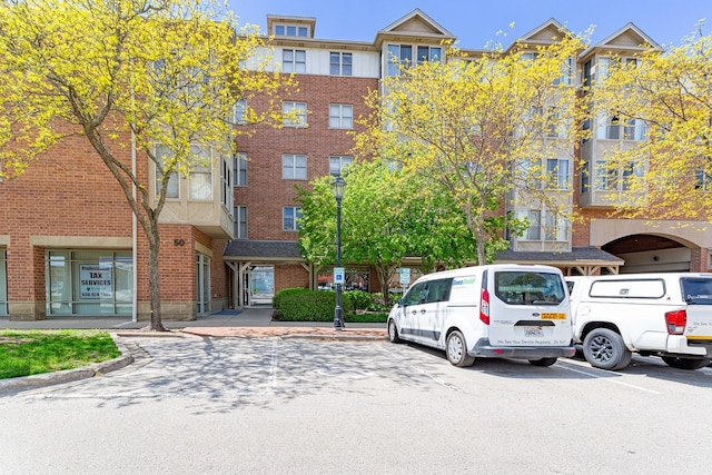 50 N Bokelman Ave Unit 233, Roselle, IL 60172 - view of property featuring uncovered parking