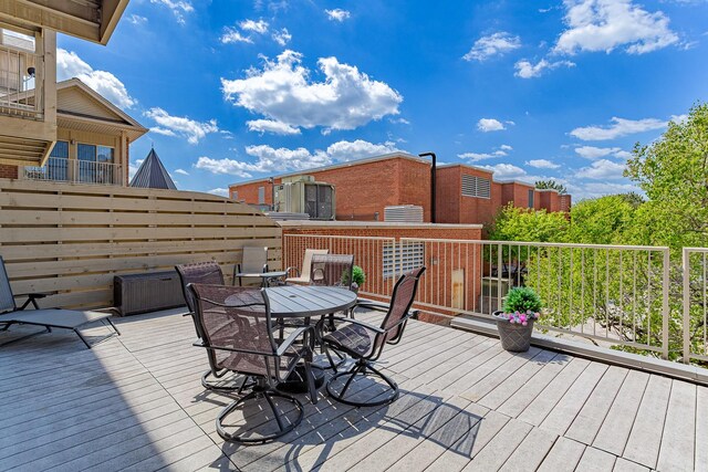 50 N Bokelman Ave Unit 233, Roselle, IL 60172 - wooden deck featuring outdoor dining space