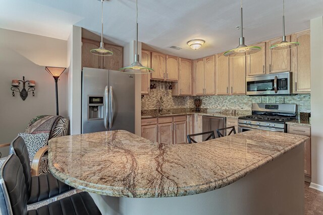 50 N Bokelman Ave Unit 233, Roselle, IL 60172 - kitchen with stainless steel appliances, light brown cabinetry, light stone counters, and backsplash