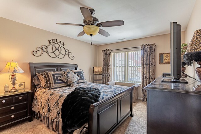 50 N Bokelman Ave Unit 233, Roselle, IL 60172 - bedroom featuring light colored carpet, ceiling fan, and baseboards