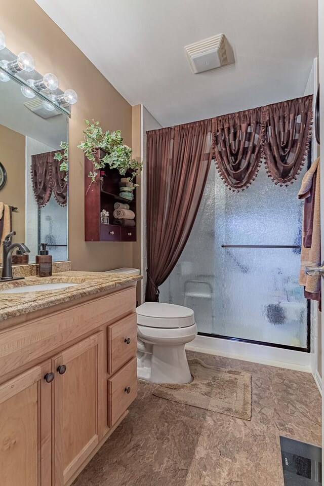 50 N Bokelman Ave Unit 233, Roselle, IL 60172 - bathroom featuring vanity, toilet, and a shower with curtain