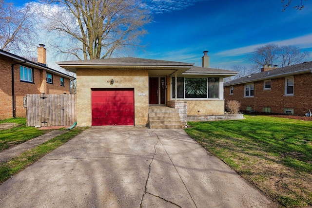 10145 Lawrence Ct, Oak Lawn, IL 60453 - view of front of house featuring an attached garage, a chimney, concrete driveway, a front lawn, and brick siding