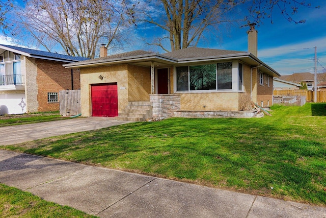10145 Lawrence Ct, Oak Lawn, IL 60453 - view of front facade featuring a chimney, brick siding, a garage, concrete driveway, and a front yard