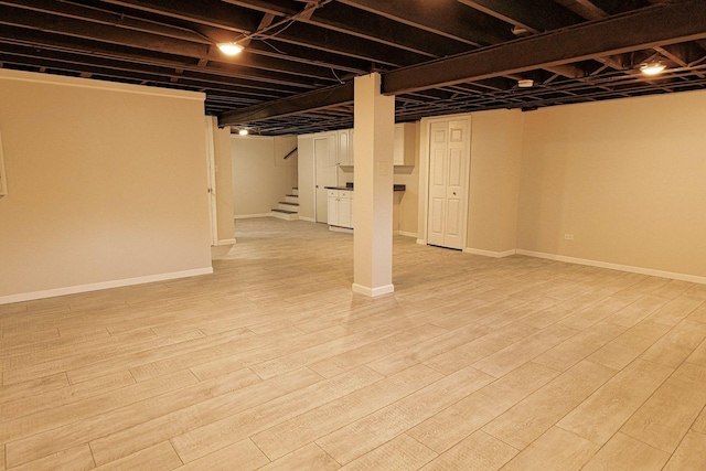 10145 Lawrence Ct, Oak Lawn, IL 60453 - finished basement featuring baseboards and light wood-style flooring