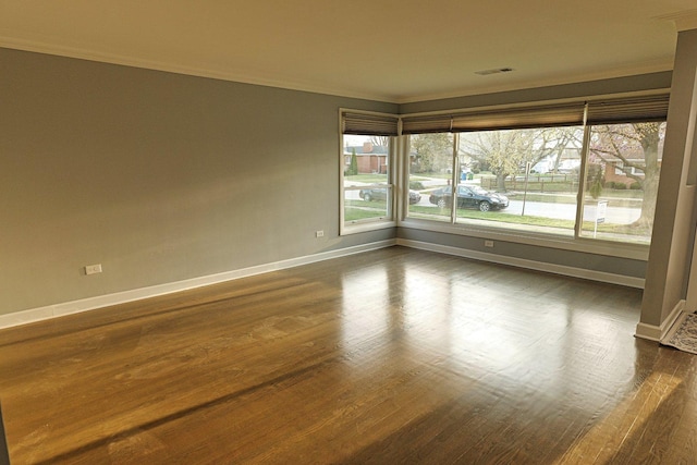 10145 Lawrence Ct, Oak Lawn, IL 60453 - unfurnished room with ornamental molding, baseboards, dark wood-style floors, and visible vents