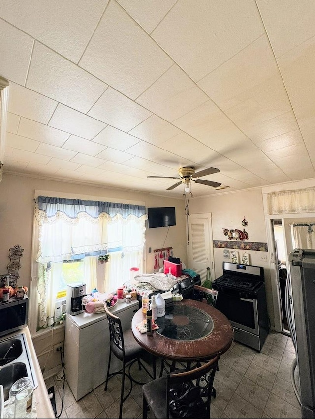 6427 S Winchester Ave, Chicago, IL 60636 - dining area with a ceiling fan and tile patterned flooring