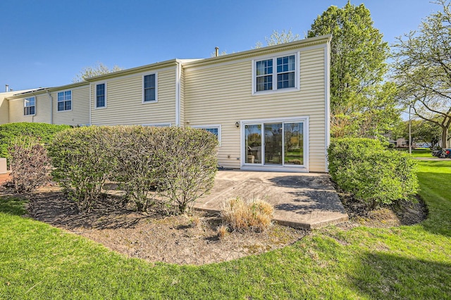 1650 Pebble Beach Cir, Elgin, IL 60123 - rear view of property featuring a yard and a patio area