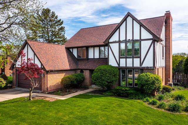 1352 Goldenrod Dr, Naperville, IL 60540 - tudor-style house featuring brick siding, stucco siding, a chimney, and a shingled roof