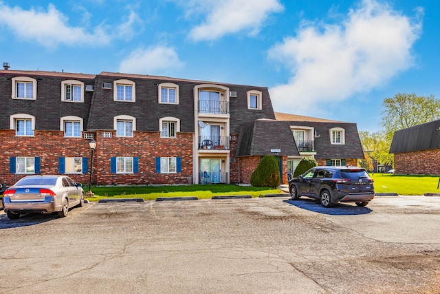 17963 Huntleigh Ct Unit 302, Country Club Hills, IL 60478 - view of building exterior featuring uncovered parking
