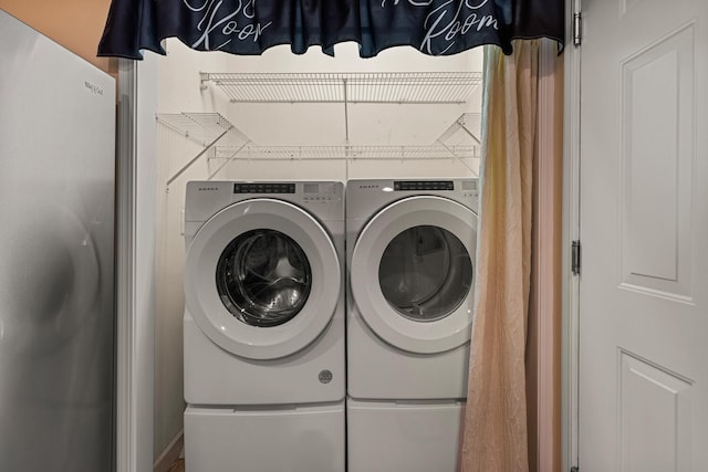 laundry area featuring washer and clothes dryer