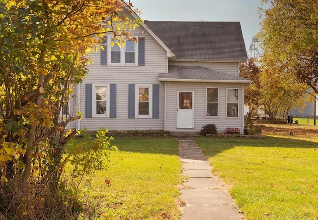 642 Angling Rd, Paw Paw, IL 61353 - view of front of house featuring a front lawn and roof with shingles