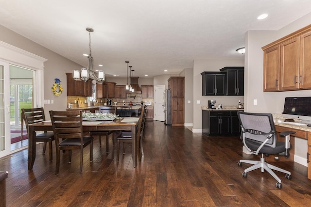 9760 Janel Dr, Bloomington, IL 61705 - dining room with dark wood-style flooring, recessed lighting, baseboards, a chandelier, and an office area