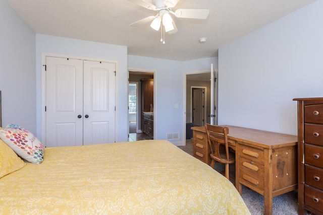 9760 Janel Dr, Bloomington, IL 61705 - bedroom with a closet, carpet flooring, connected bathroom, and ceiling fan