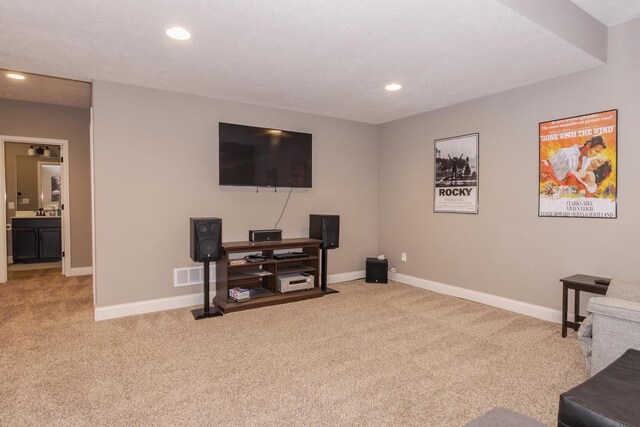 9760 Janel Dr, Bloomington, IL 61705 - sitting room with carpet flooring, baseboards, and recessed lighting