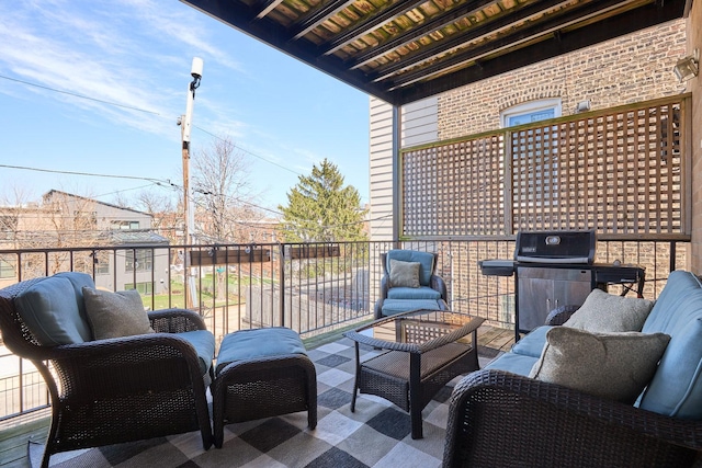 view of patio / terrace with a balcony, outdoor lounge area, and area for grilling
