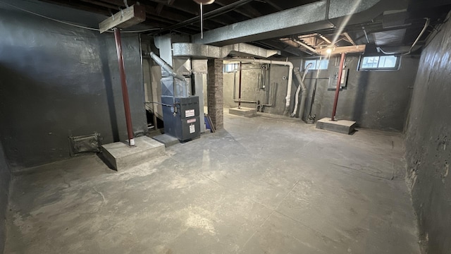 basement featuring heating unit