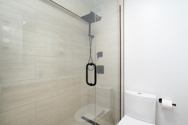 1560 N Sandburg Ter Unit 2506J, Chicago, IL 60610 - bathroom with toilet and a stall shower