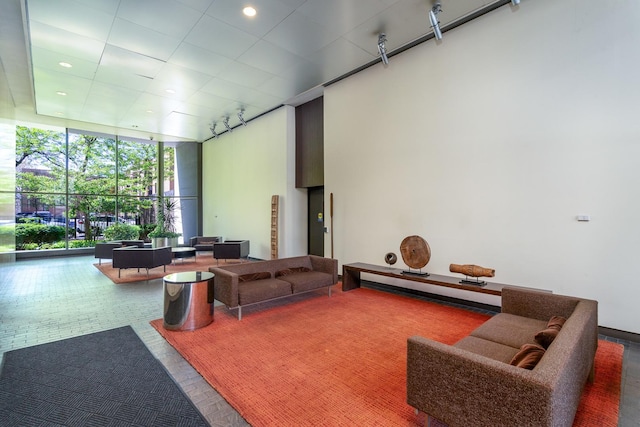 1560 N Sandburg Ter Unit 2506J, Chicago, IL 60610 - building lobby with floor to ceiling windows and recessed lighting