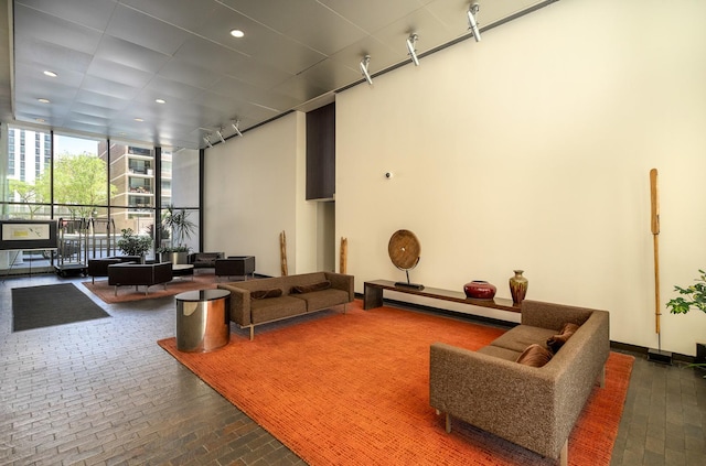1560 N Sandburg Ter Unit 2506J, Chicago, IL 60610 - building lobby with floor to ceiling windows and recessed lighting
