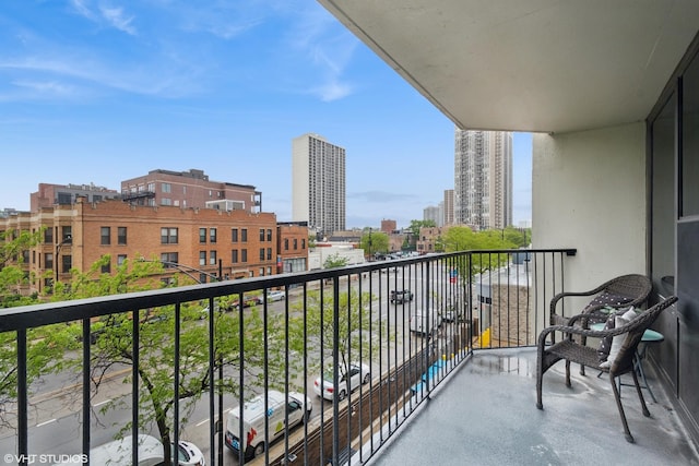 1560 N Sandburg Ter Unit 411J, Chicago, IL 60610 - balcony featuring a view of city