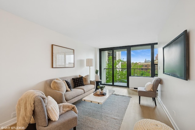 1560 N Sandburg Ter Unit 411J, Chicago, IL 60610 - living room with wood finished floors and baseboards