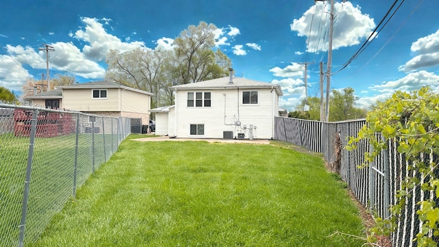 rear view of house featuring cooling unit