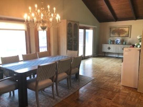 23105 N High Ridge Rd, Barrington, IL 60010 - dining area featuring a chandelier, high vaulted ceiling, beamed ceiling, and wood ceiling