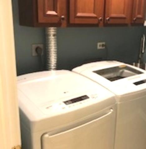 23105 N High Ridge Rd, Barrington, IL 60010 - laundry area featuring washing machine and dryer and cabinet space