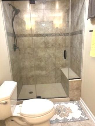 23105 N High Ridge Rd, Barrington, IL 60010 - full bath with toilet, a stall shower, and baseboards