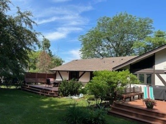 23105 N High Ridge Rd, Barrington, IL 60010 - rear view of house featuring a wooden deck and a lawn