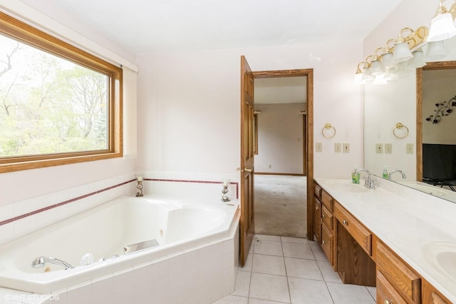 296 Regina Ln, Belvidere, IL 61008 - bathroom with double vanity, a whirlpool tub, and tile patterned floors