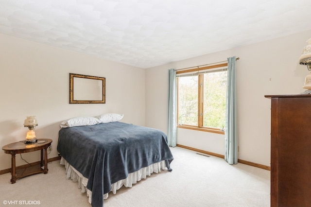 296 Regina Ln, Belvidere, IL 61008 - bedroom with baseboards and light colored carpet