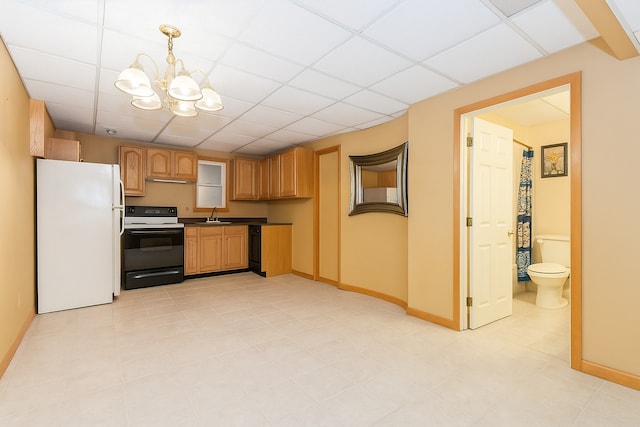 296 Regina Ln, Belvidere, IL 61008 - kitchen with freestanding refrigerator, electric range oven, a sink, a chandelier, and baseboards