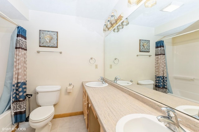 296 Regina Ln, Belvidere, IL 61008 - bathroom with toilet, shower / bath combination with curtain, tile patterned flooring, and double vanity