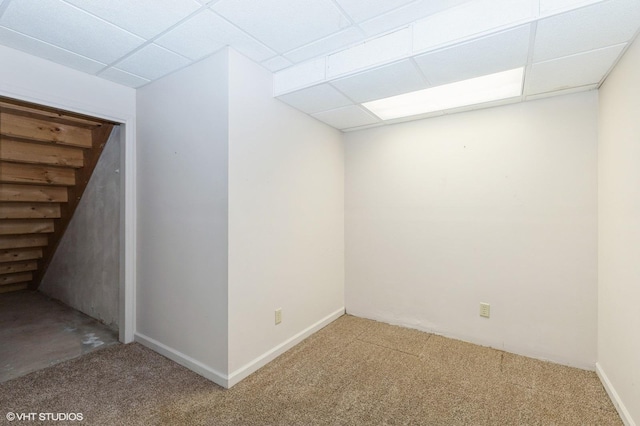 296 Regina Ln, Belvidere, IL 61008 - below grade area featuring a paneled ceiling, carpet, and stairway