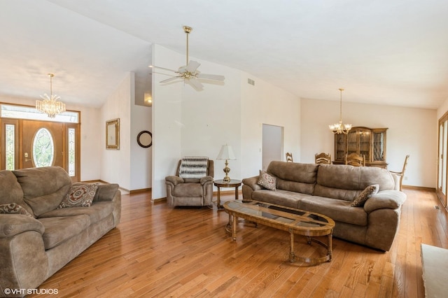 296 Regina Ln, Belvidere, IL 61008 - living area with a chandelier, lofted ceiling, light wood-style floors, baseboards, and ceiling fan