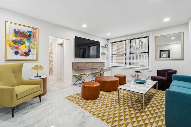 living room with marble finish flooring and recessed lighting