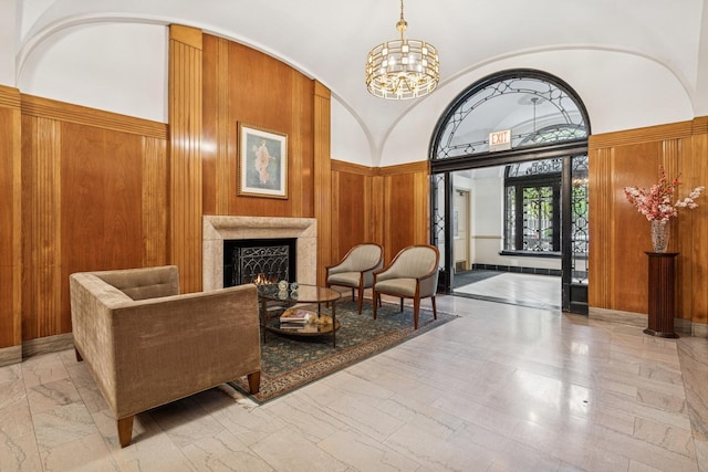 building lobby featuring wood walls