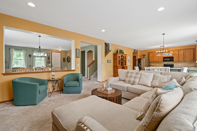 24210 Apple Creek Ln, Plainfield, IL 60586 - living room with a chandelier, light colored carpet, baseboards, stairway, and recessed lighting