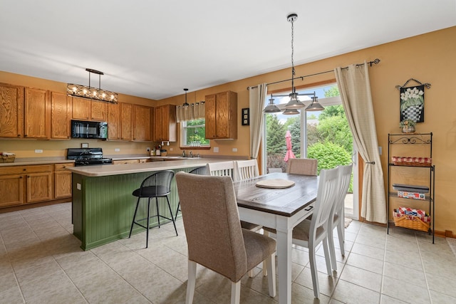 24210 Apple Creek Ln, Plainfield, IL 60586 - dining area with light tile patterned floors and baseboards