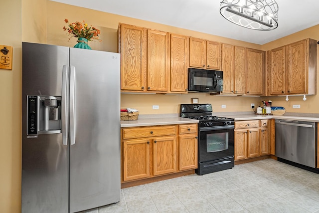 24210 Apple Creek Ln, Plainfield, IL 60586 - kitchen featuring black appliances, light countertops, and light tile patterned flooring