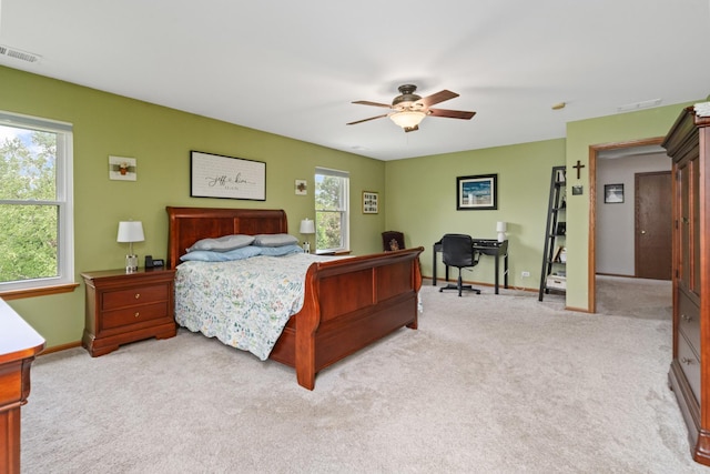 24210 Apple Creek Ln, Plainfield, IL 60586 - bedroom featuring light carpet, an office area, baseboards, and a ceiling fan