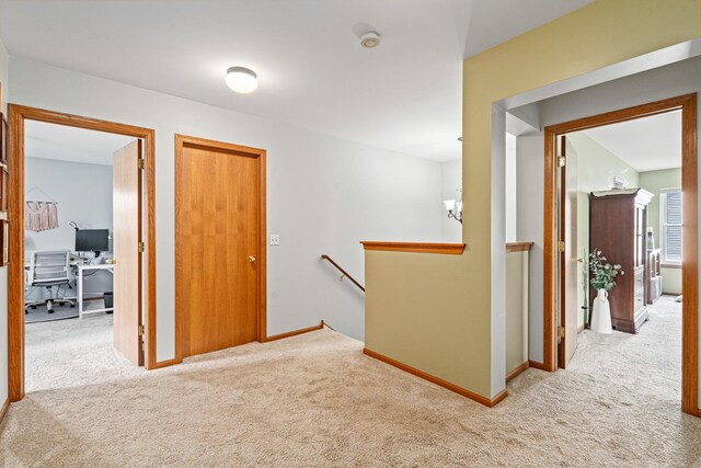 24210 Apple Creek Ln, Plainfield, IL 60586 - hallway with an upstairs landing, carpet flooring, an office area, and baseboards