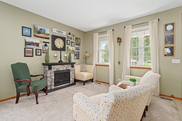 24210 Apple Creek Ln, Plainfield, IL 60586 - living room featuring carpet floors, baseboards, and a fireplace