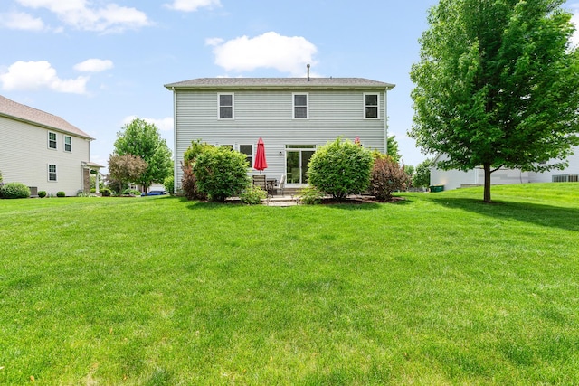 24210 Apple Creek Ln, Plainfield, IL 60586 - rear view of house featuring a lawn and a patio area
