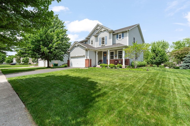 24210 Apple Creek Ln, Plainfield, IL 60586 - view of front of home featuring a porch, driveway, a front yard, and a garage