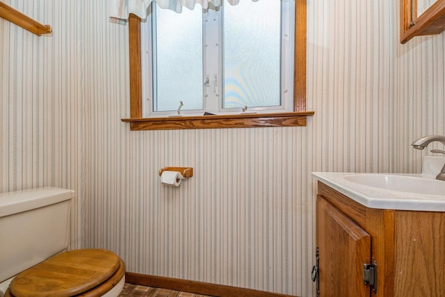 10756 Mason Ave, Chicago Ridge, IL 60415 - bathroom with vanity, toilet, and wallpapered walls