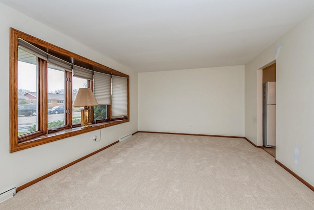 10756 Mason Ave, Chicago Ridge, IL 60415 - empty room featuring light carpet, baseboards, visible vents, and a baseboard heating unit